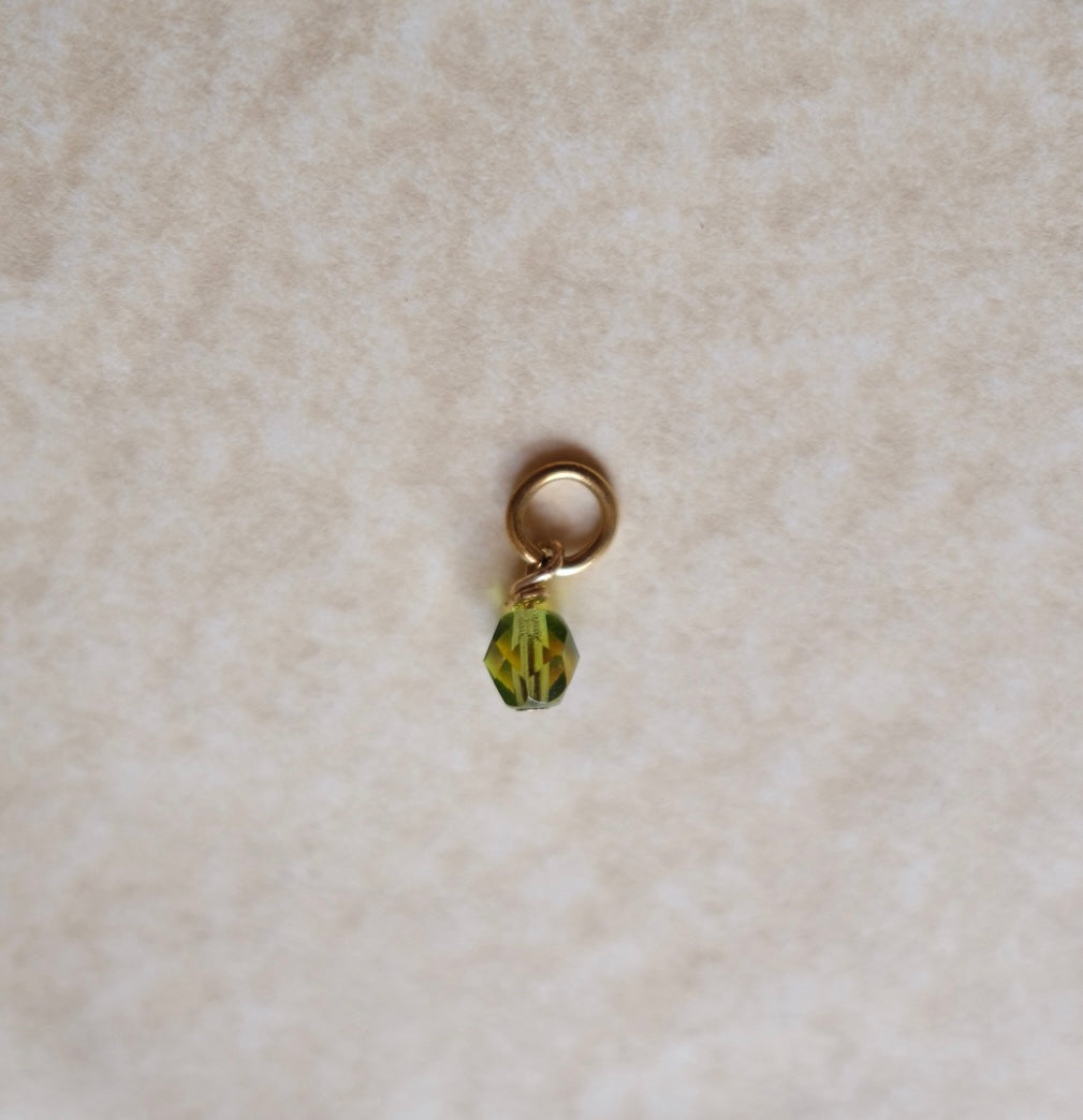 Tiny light green charm C89