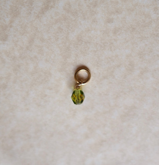 Tiny light green charm C89