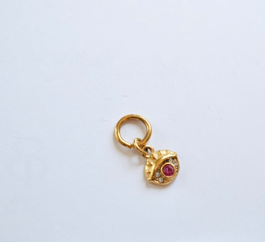 Tiny pink eye charm C36